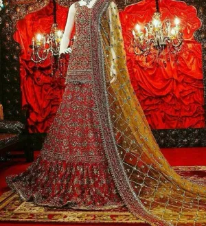 Beautiful bridal lahnga in maroonish red and greenish golden color Model #W 1010