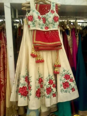 Beutifull hand lahnga set with threds work in offwhite gold and red color Model #W 888