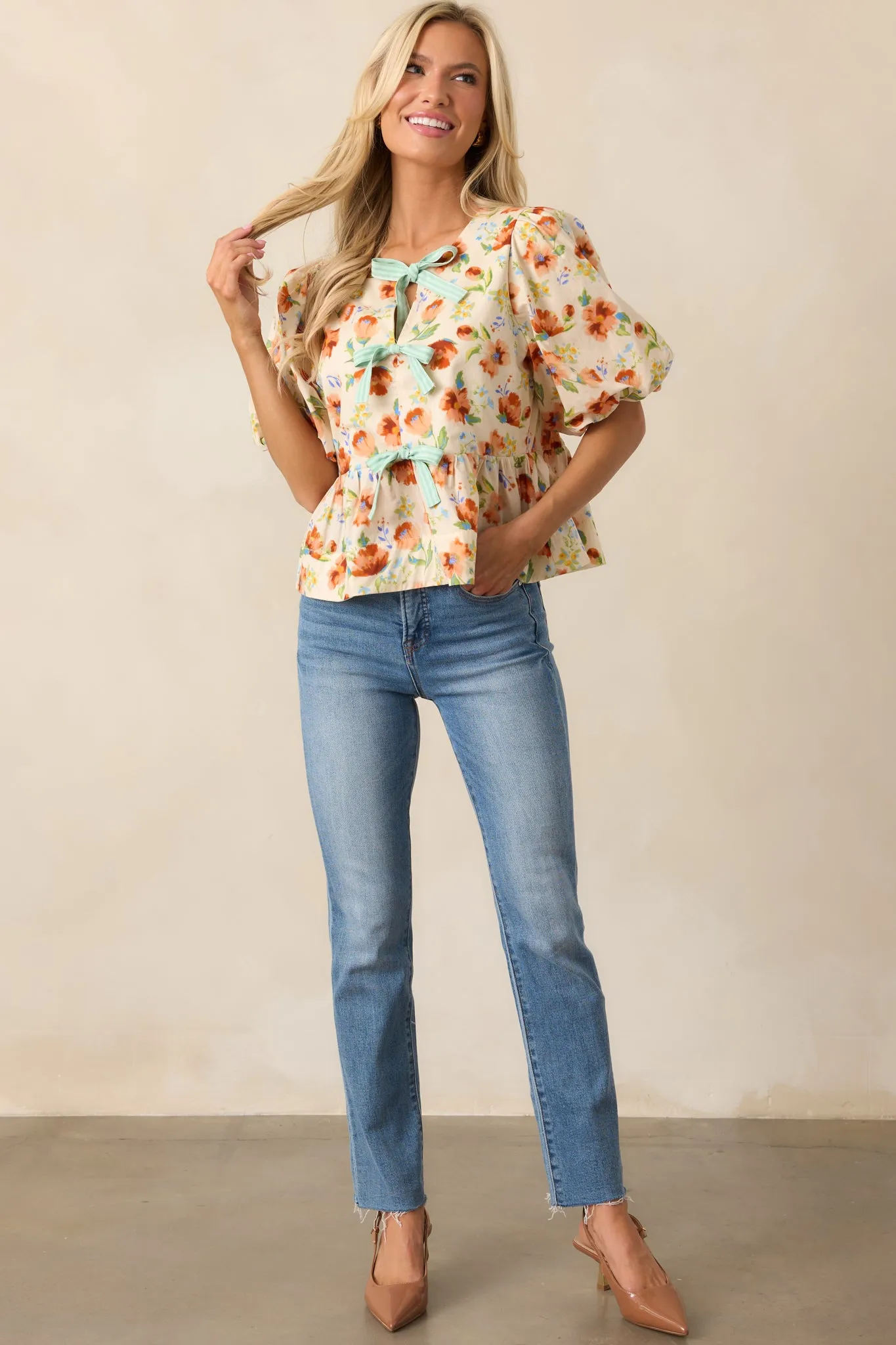 Beyond Compare Ecru Floral Cotton Bow Front Peplum Top