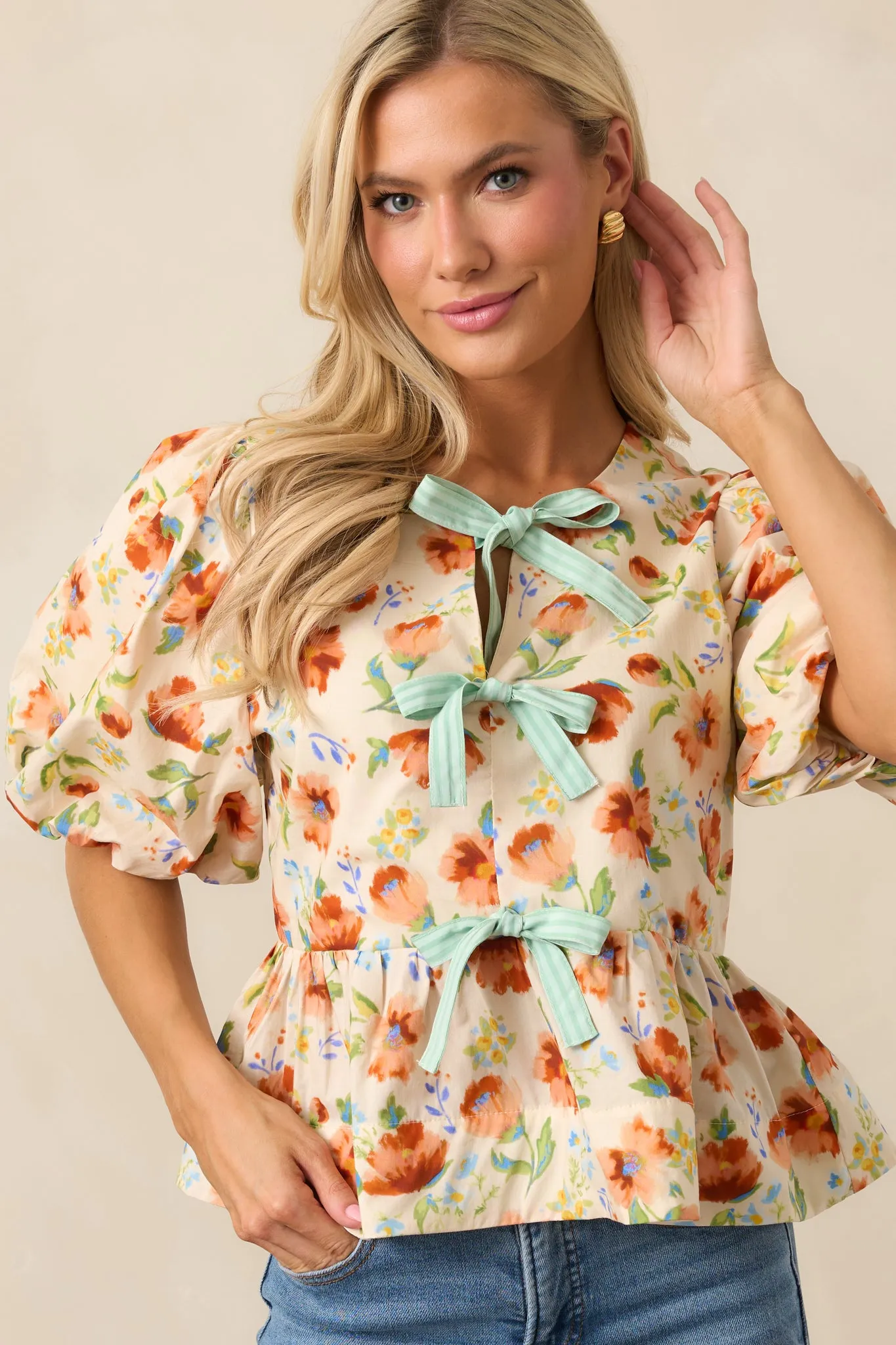 Beyond Compare Ecru Floral Cotton Bow Front Peplum Top