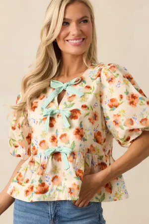 Beyond Compare Ecru Floral Cotton Bow Front Peplum Top