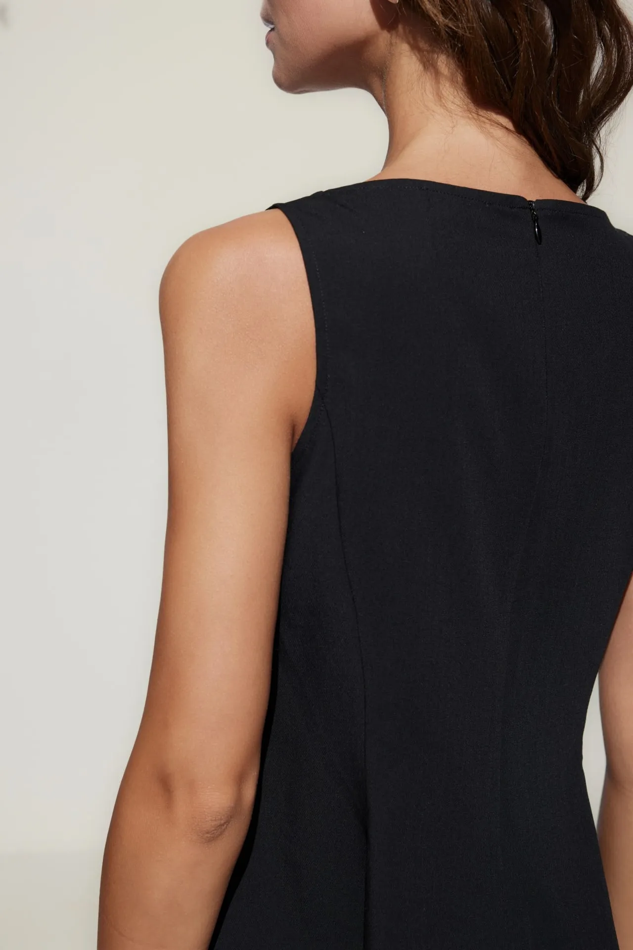 Rayon Blend Peplum Sleeveless Top