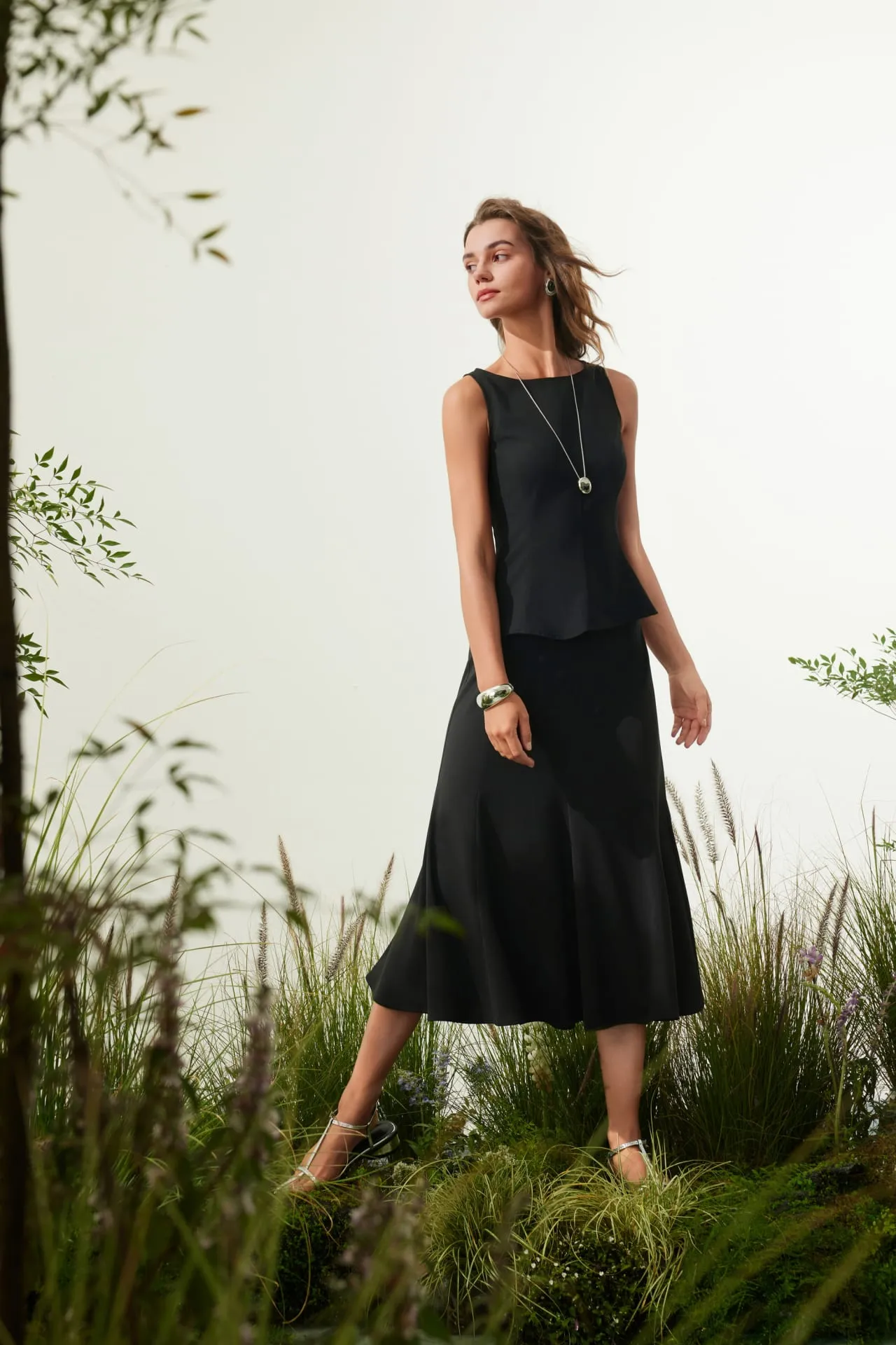 Rayon Blend Peplum Sleeveless Top