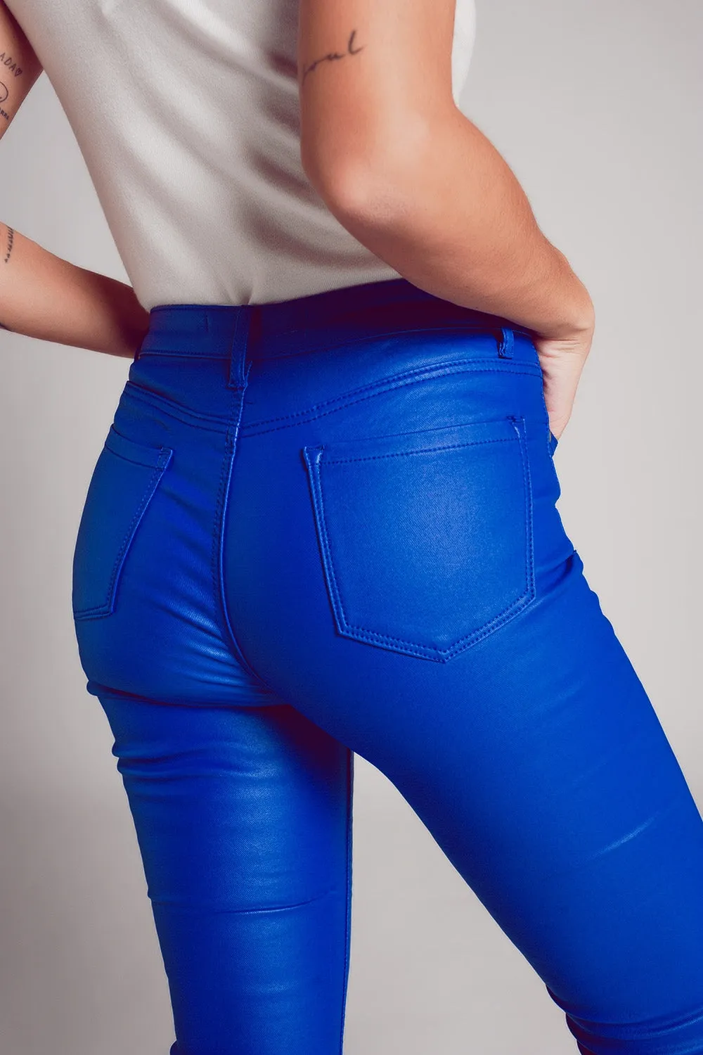 Stretch faux leather flare pants in blue