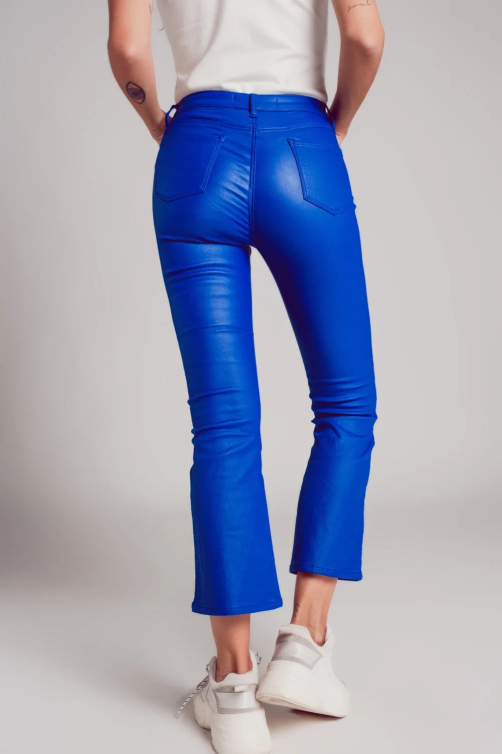 Stretch faux leather flare pants in blue