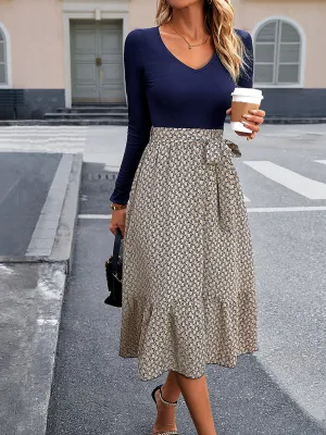 V-neck Long-Sleeved Dress with Geometric Print and Asymmetrical Hem