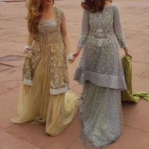 Wedding party lahnga set in net cloth with dabka zari nagh pearls and threads work Model# P 298