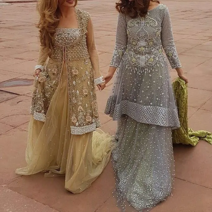Wedding party lahnga set in net cloth with dabka zari nagh pearls and threads work Model# P 298